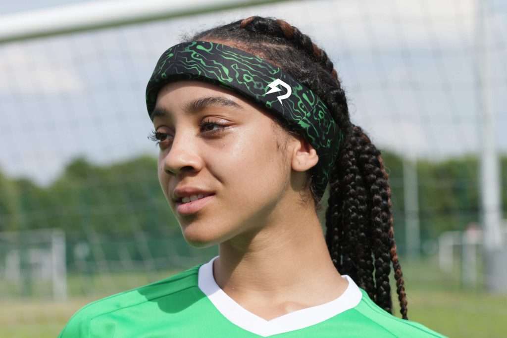 Female footballer wearing Rezon Halos