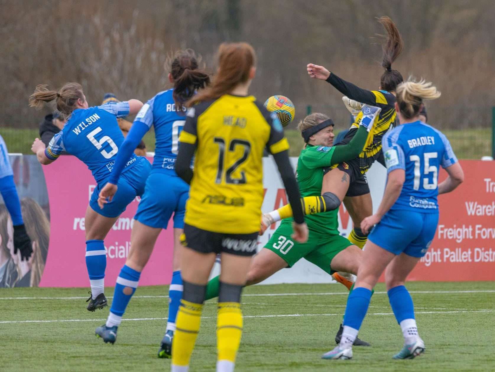 Women's football wearing Halos