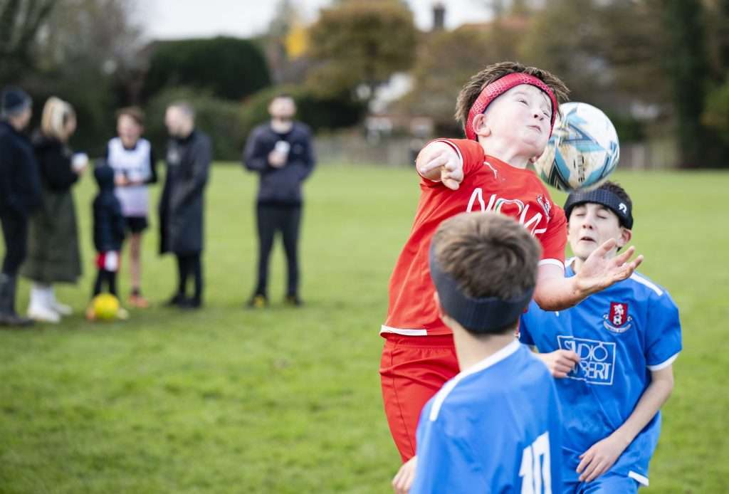 Kids football wearing Rezon Halos