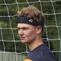 Rezon Halos® being worn by a defender in front of a football goal