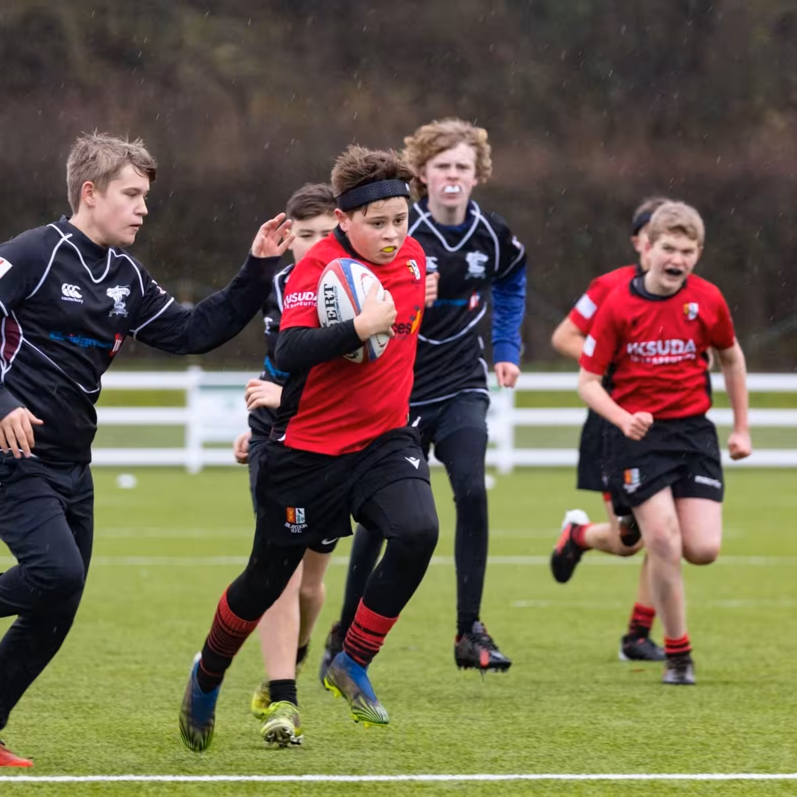 Rezon Halos® brain protection worn in boy’s rugby. Rezon Halos® brain protection worn in boy's rugby.