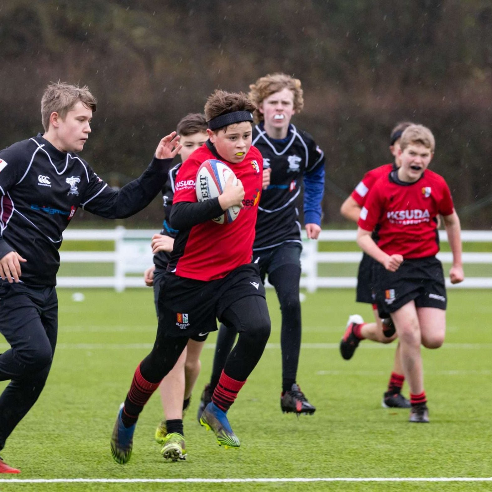 Rezon Halos® brain protection worn in boy's rugby.