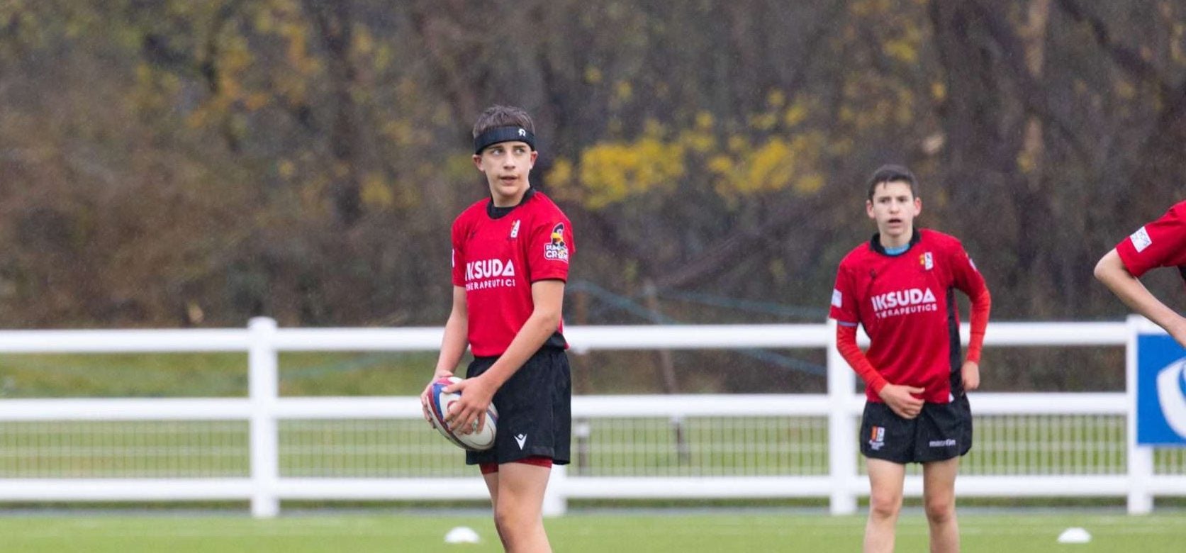 A youth rugby player wearing Rezon Halos® brain protection.
