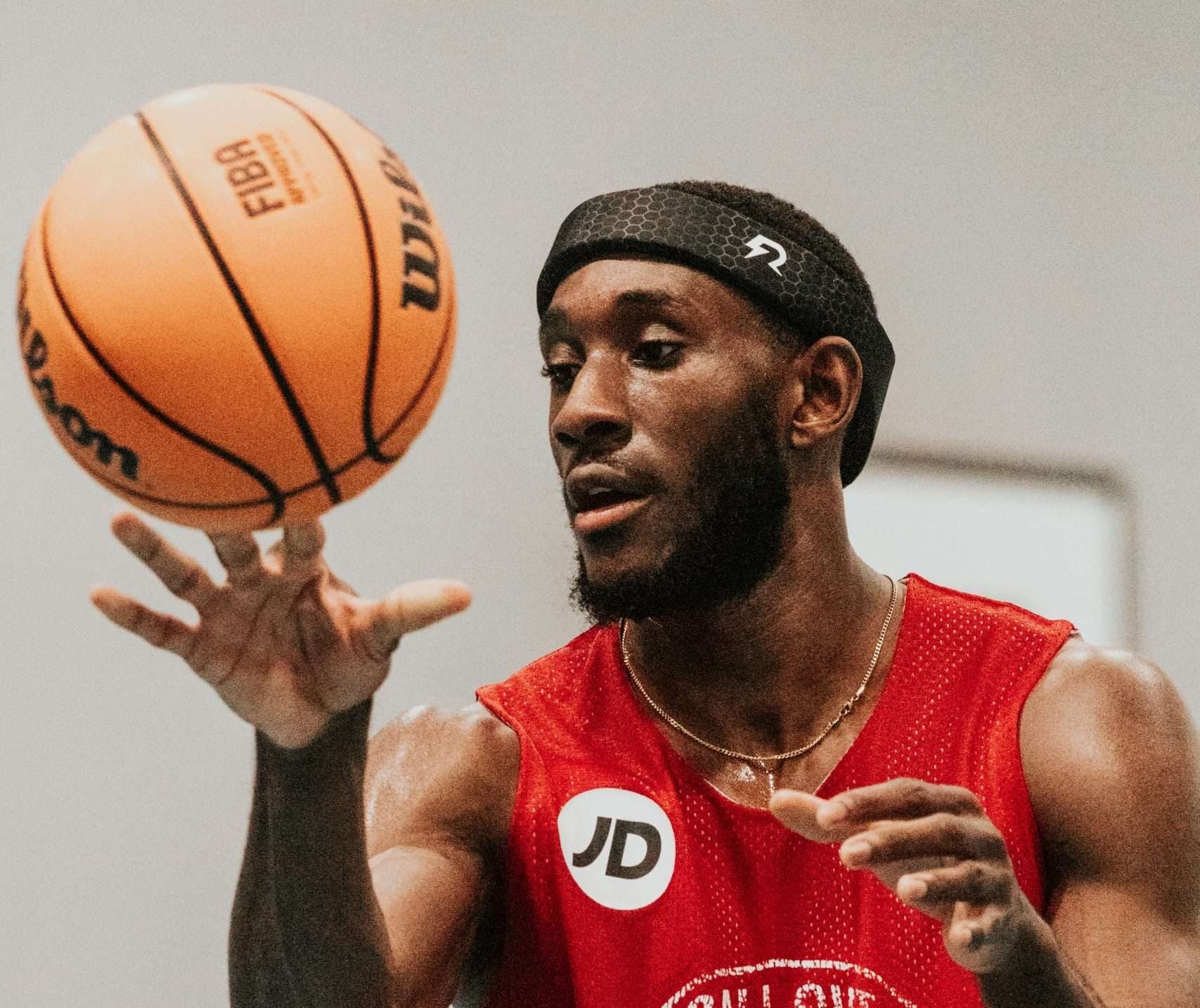 Basketball player, Daniel Johnson Thompson, wearing Rezon Halos® brain protection. Basketball player, Daniel Johnson Thompson, wearing Rezon Halos® brain protection.