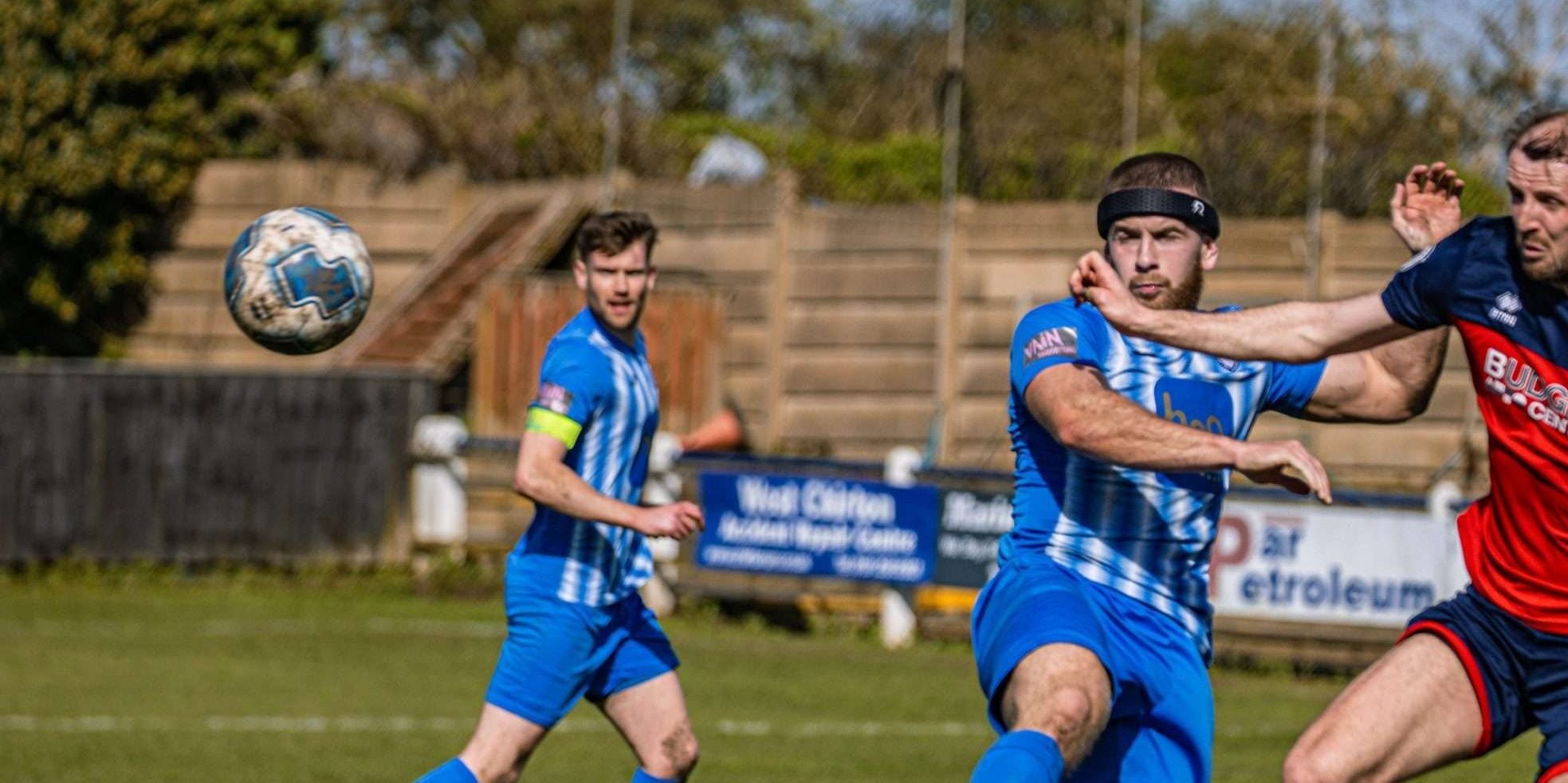 Paddy Almond playing football while wearing Rezon Halos® concussion protection.